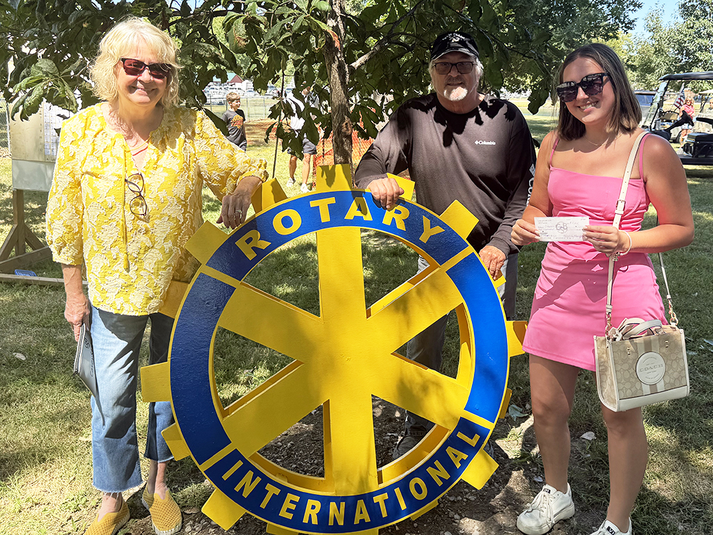 Rotary_ Lauren Repp Lauren Repp was the winner of the Casey Rotary annual Bessie Bingo fundraiser. Lauren (right) received the $1,000 donation from Casey Rotary Club President Marcy Mumford (left). Also pictured is Rotarian Jay Markwell. —photo by Sharon Durham
