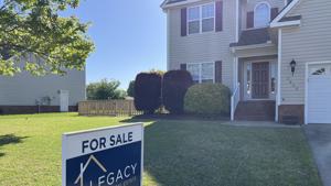 Home sales up 2% in July as prices stayed nearly flat