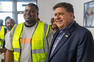 Pritzker’s office ‘extremely troubled’ by photo with suspect ‘peacekeeper’ Pritzker’s office ‘extremely troubled’ by photo with suspect ‘peacekeeper’