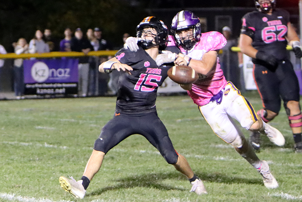 00FredThomas-Sack-ForcedFumble-FumbleRecovery Senior Fred Thomas delivers a game-changing play, sacking the Olney quarterback, stripping the ball, and making the recovery to give the Warriors possession in the second quarter.