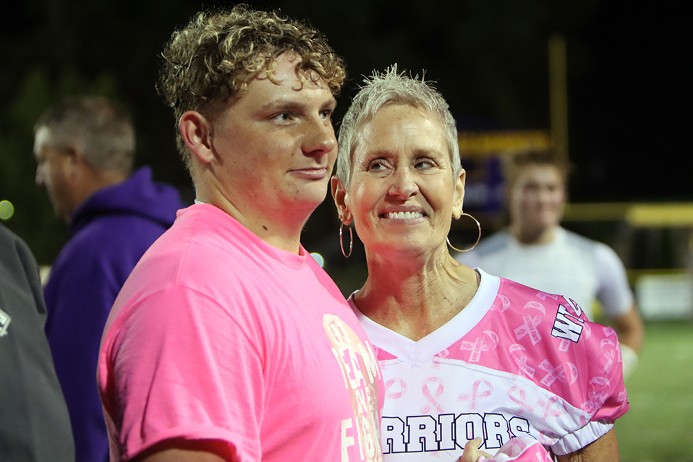55PinkOut-WyattErickson-VickiYates Wyatt Erickson wears a special jersey honoring Vicki Yates during Friday night's "Pink-Out" game.