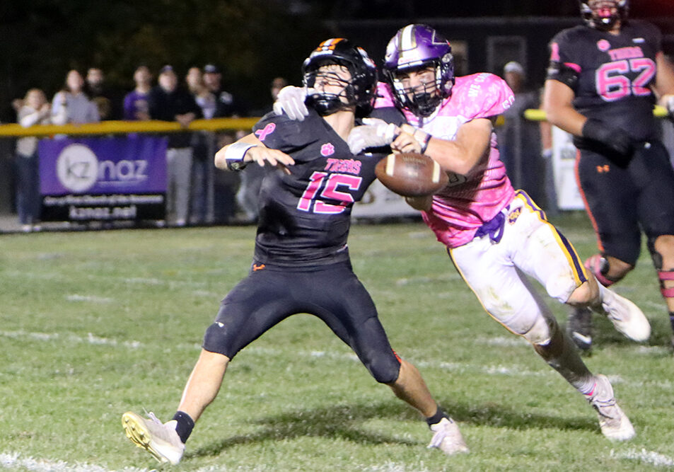 Senior Fred Thomas delivers a game-changing play, sacking the Olney quarterback, stripping the ball, and making the recovery to give the Warriors possession in the second quarter.